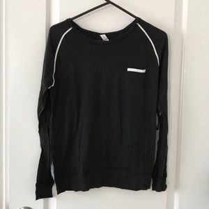 Black long sleeve lululemon shirt.